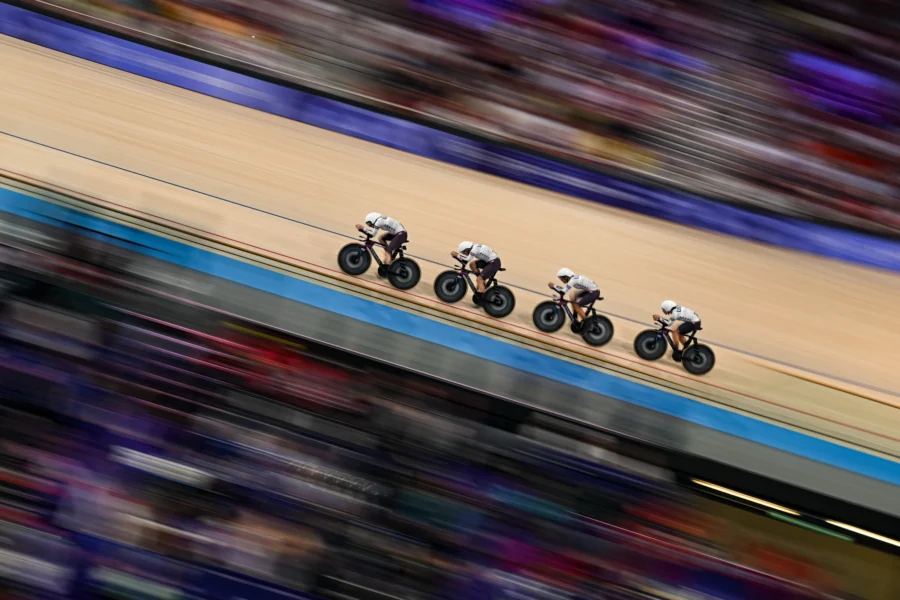 Team pursuit riders on the velodrome, track cycling at the Paris 2024 Olympic Games