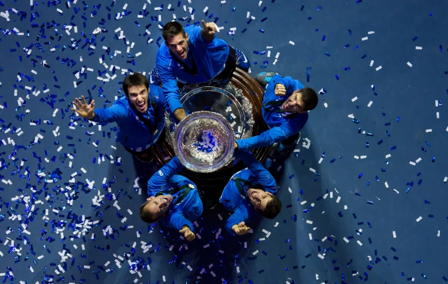 Argentina team celebrating with the Davis Cup trophy after the 2016 final